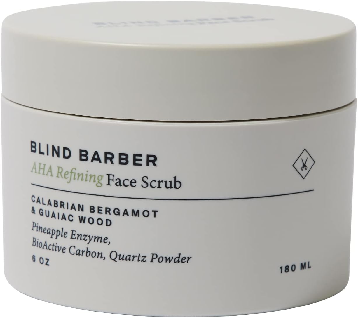 White jar of Blind Barber AHA Refining Face Scrub with text on a white background