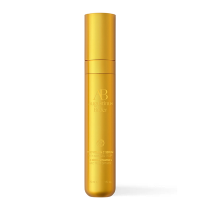 Augustinus Beller Golden C Serum bottle in a metallic gold finish, shown on a clean white background.