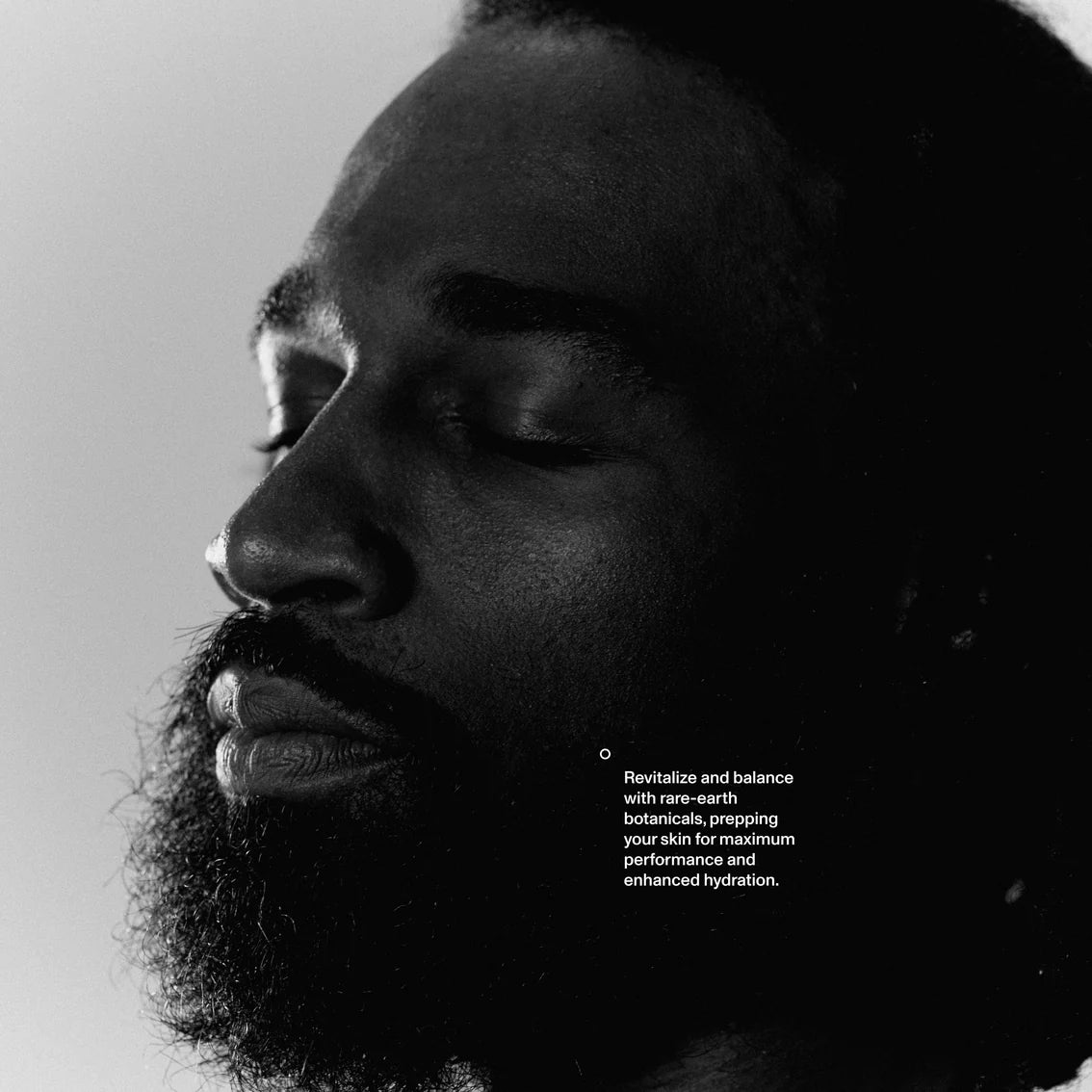Black and white portrait of a person with text overlay on a light background
