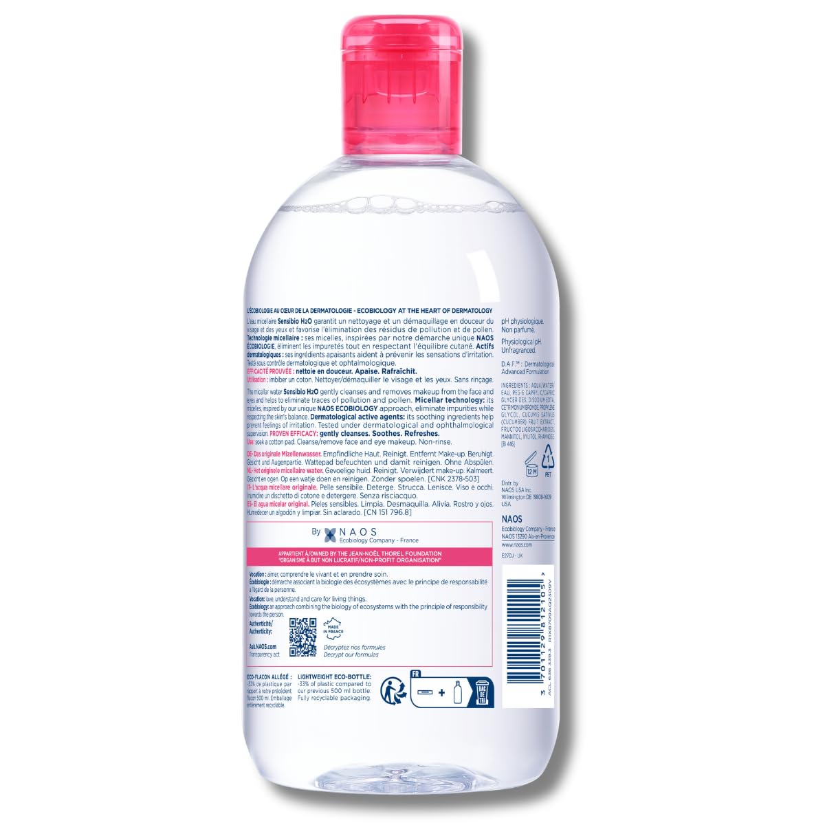 Clear bottle with pink cap on a white background