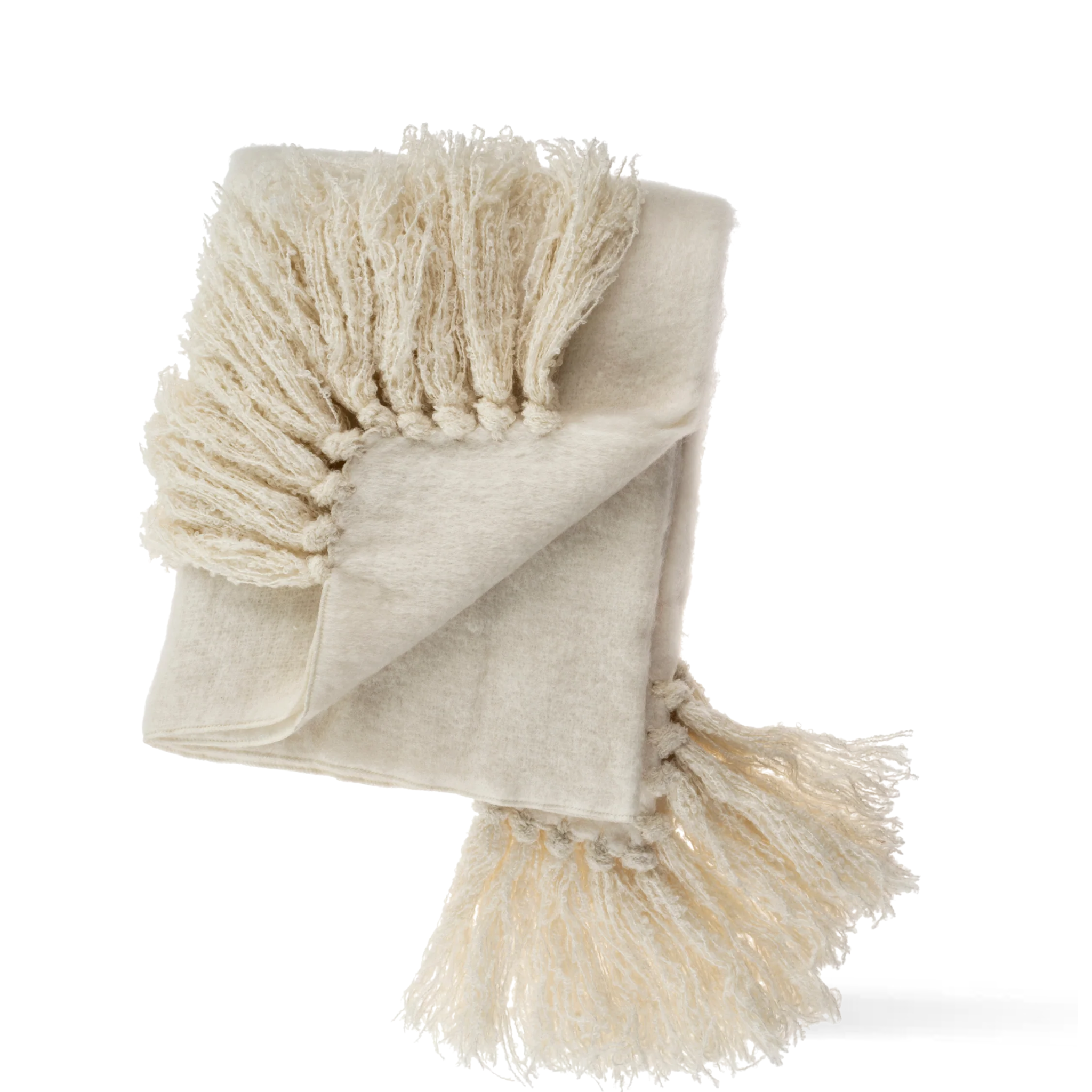 Indaba Alta Wool Blend Throw in a soft neutral colour with oversized hand-knotted tassels