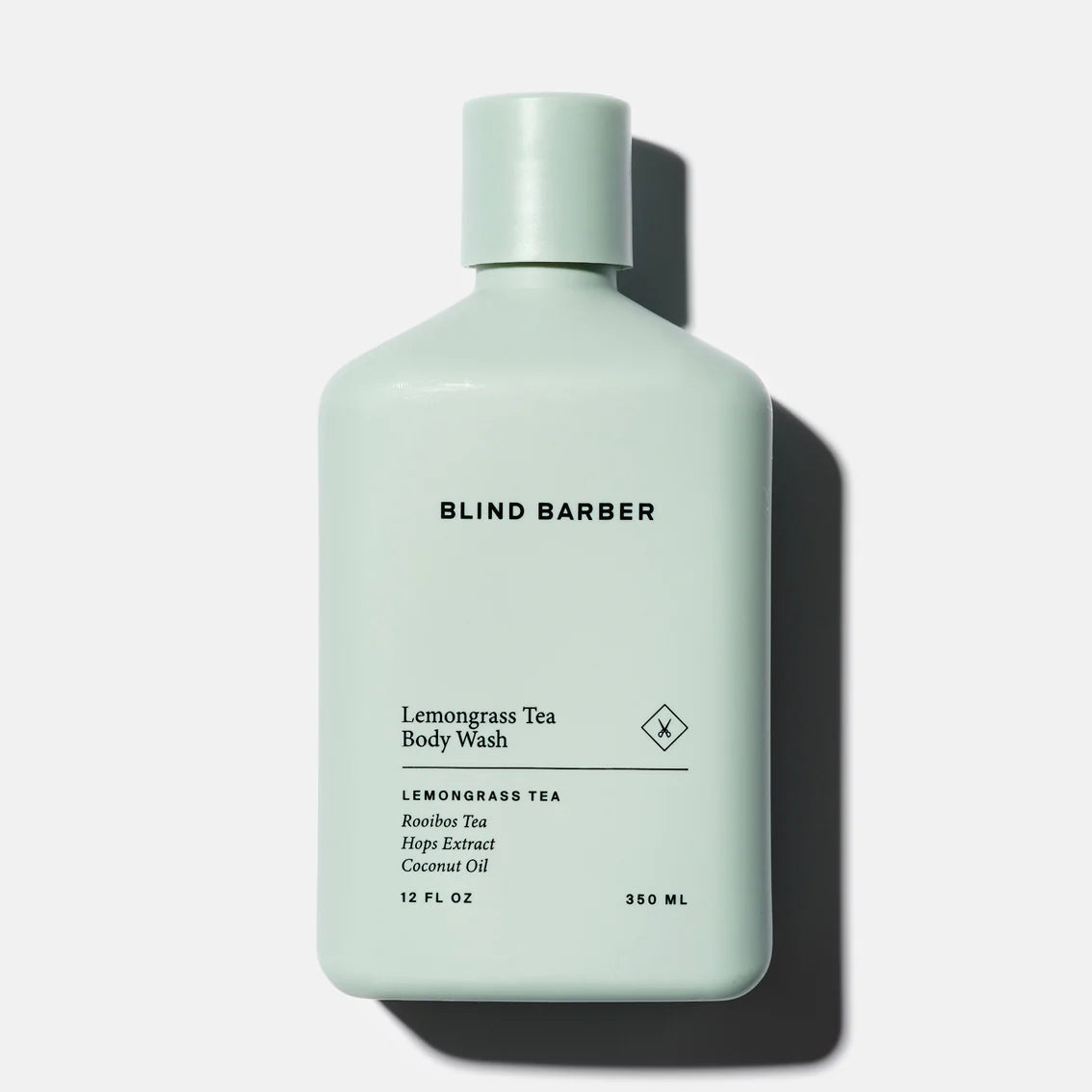 Light blue bottle of Blind Barber Lemongrass Tea Body Wash on a white background