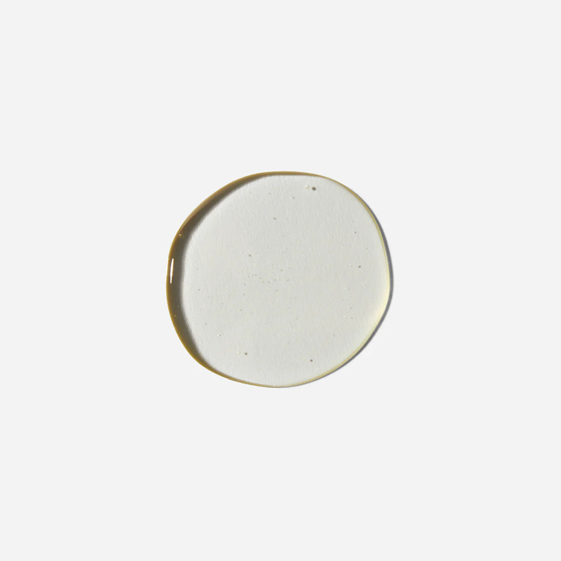 Round ceramic plate with a gold rim on a white background