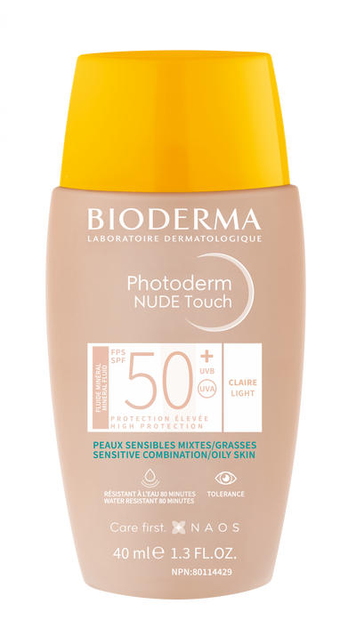 Bioderma Photoderm Nude Touch sunscreen bottle with yellow cap on a white background