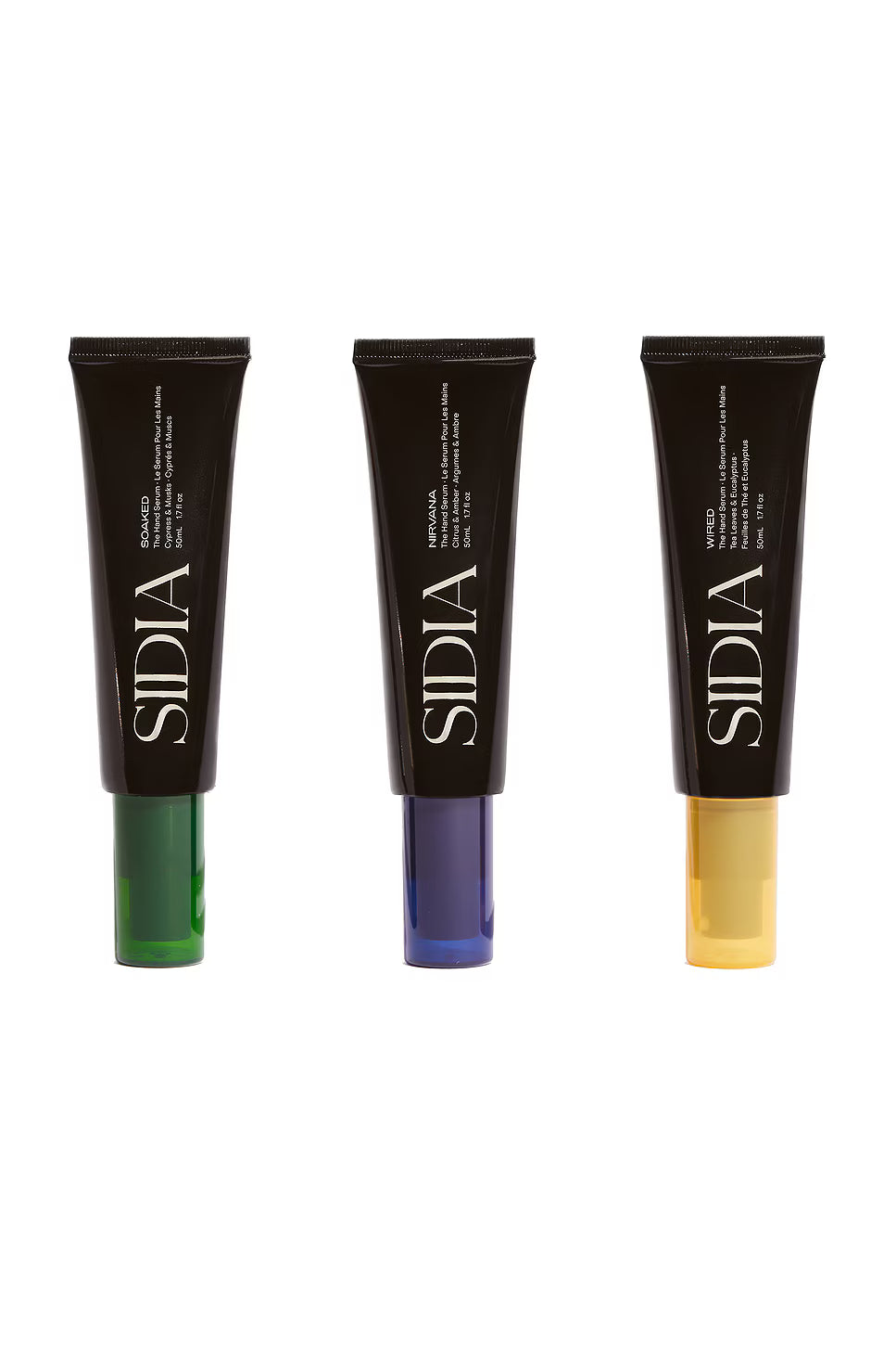 Three Sidia cosmetic tubes with different colored applicators on a white background