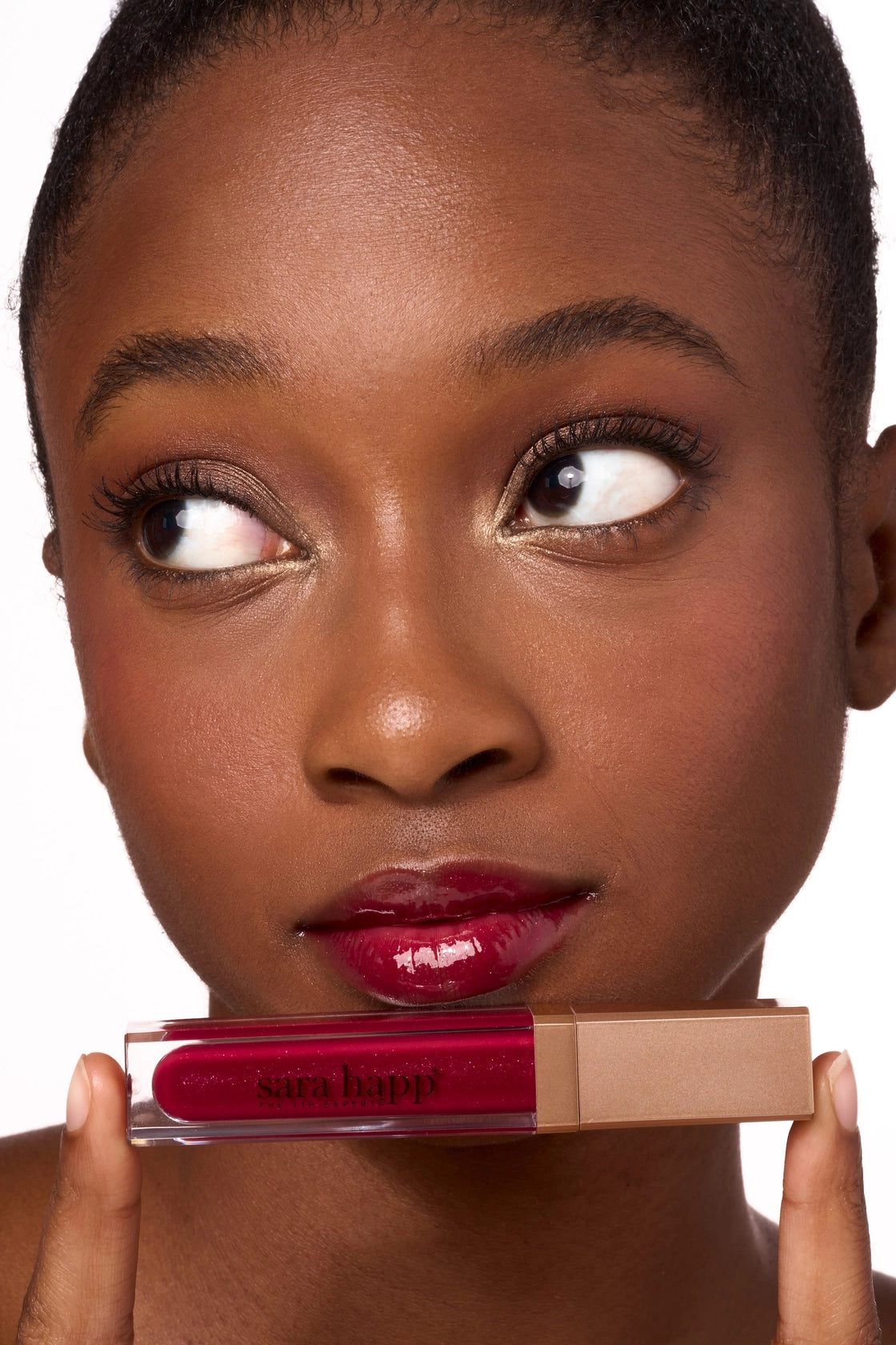 Sara Happ The Wild Berry Slip layered over matte lipstick