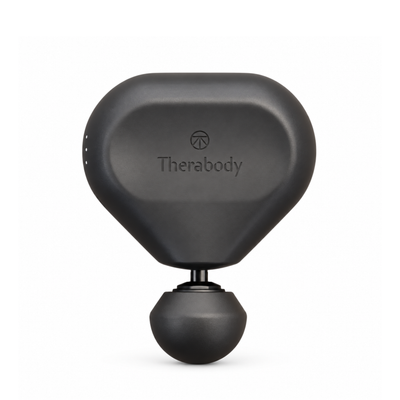 A black Therabody massage gun with a rounded head and a flexible ball attachment, shown against a plain white background.