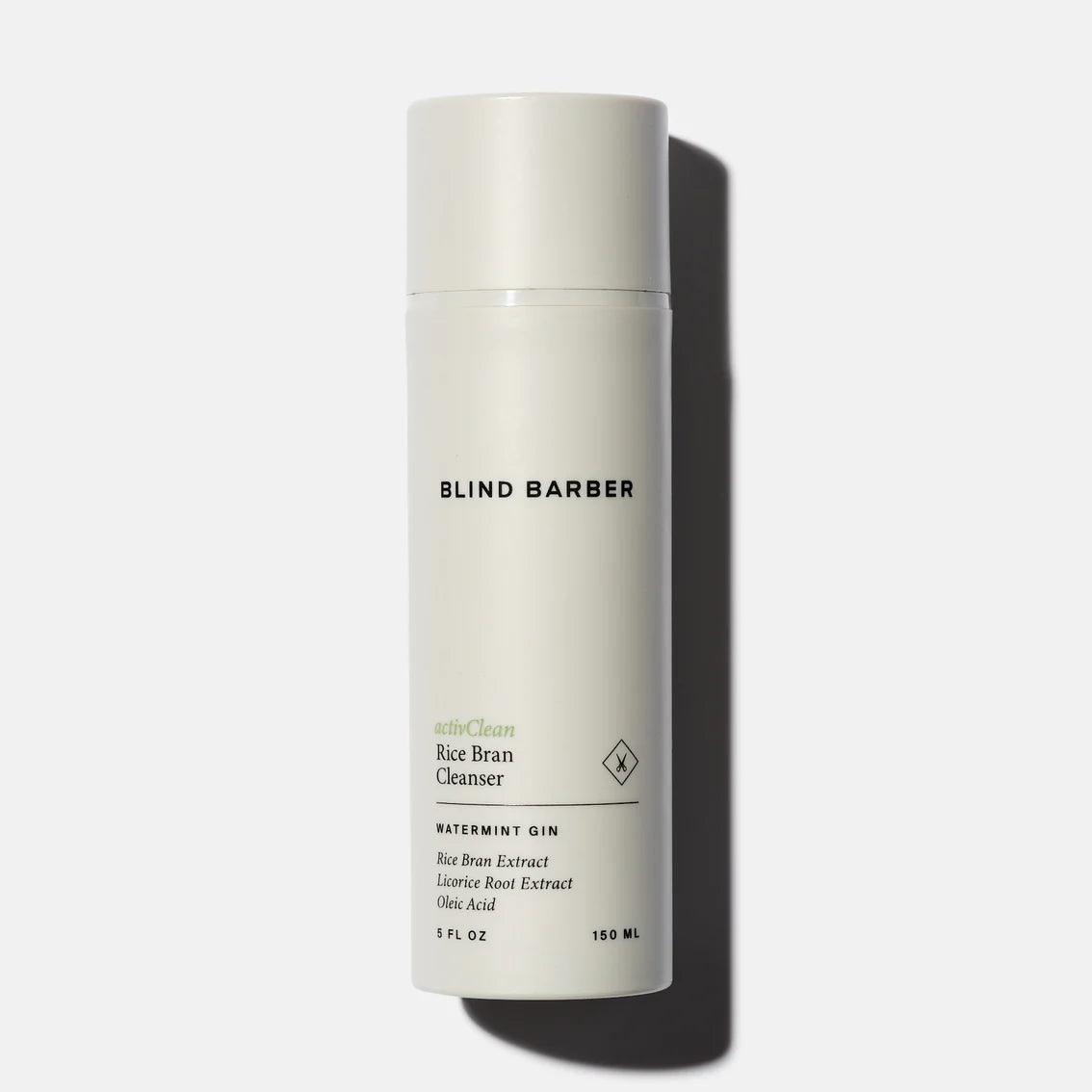 White bottle of Blind Barber hair cleanser on a white background
