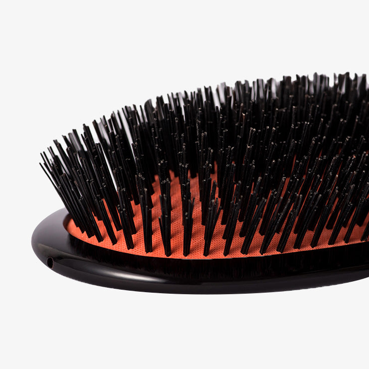 Mason Pearson Large Extra Pure Boar Bristle Hairbrush B1 in Dark Ruby — close-up of the bristles and rubber cushion