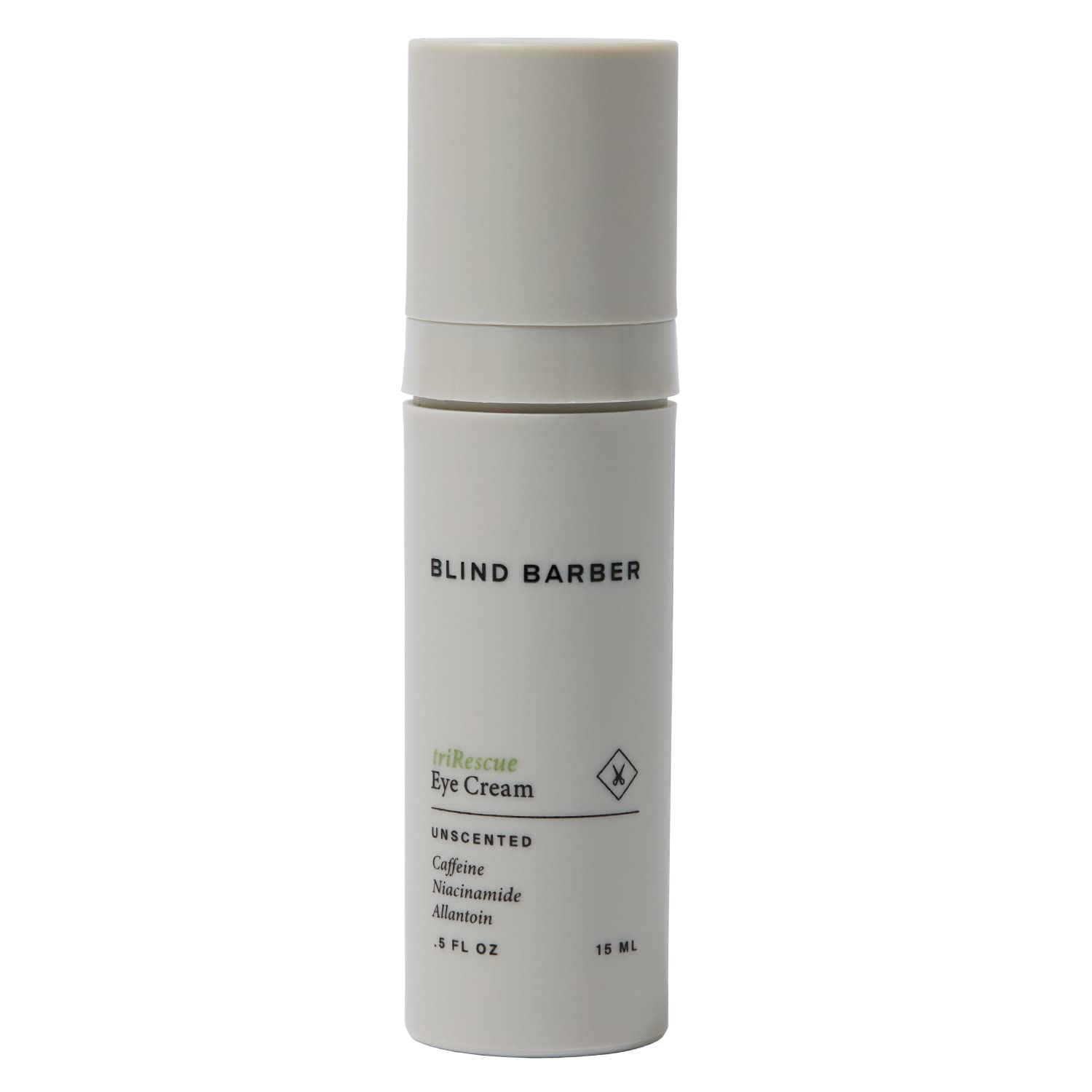 White eye cream bottle with 'Blind Barber' branding on a white background