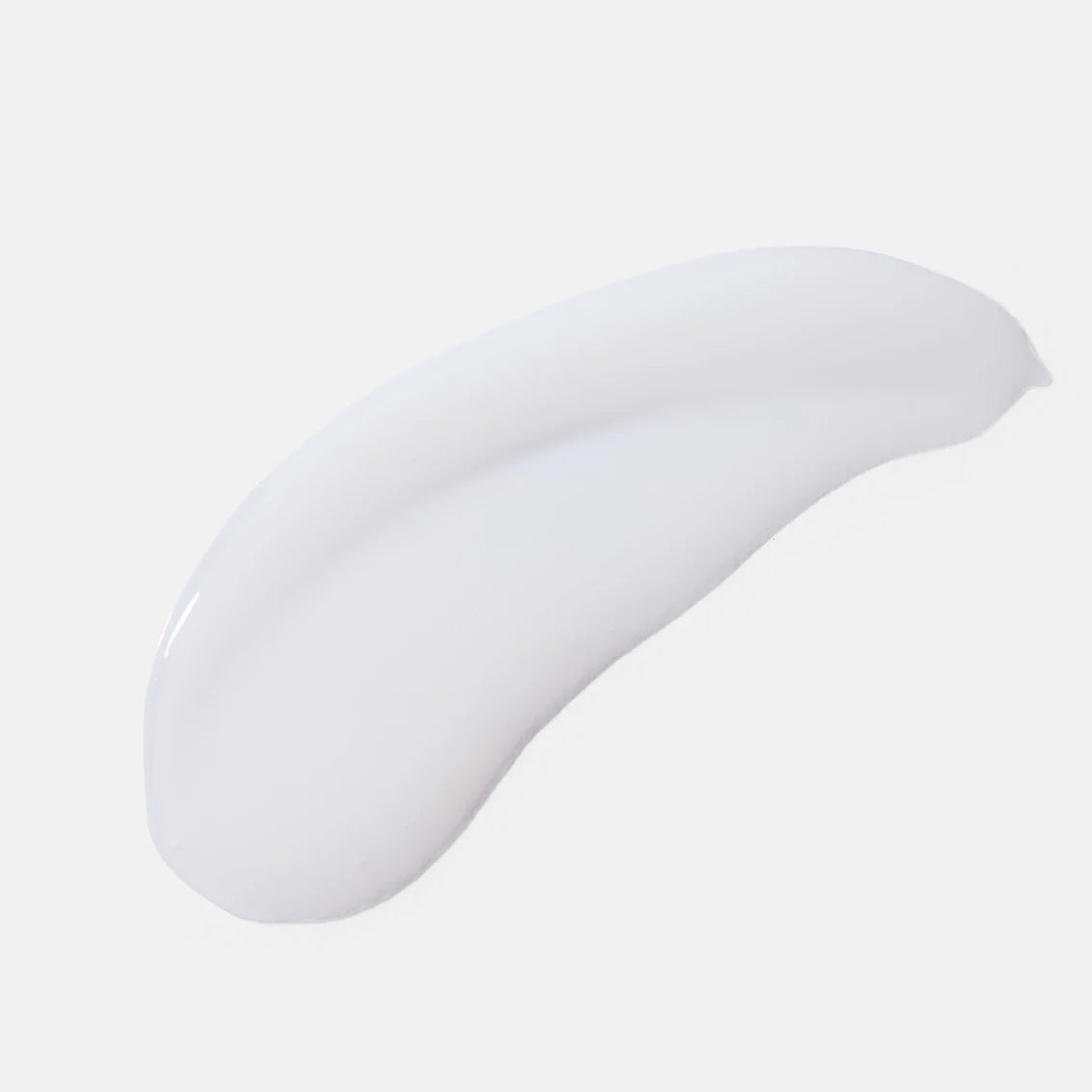 White cream swatch on a light gray background