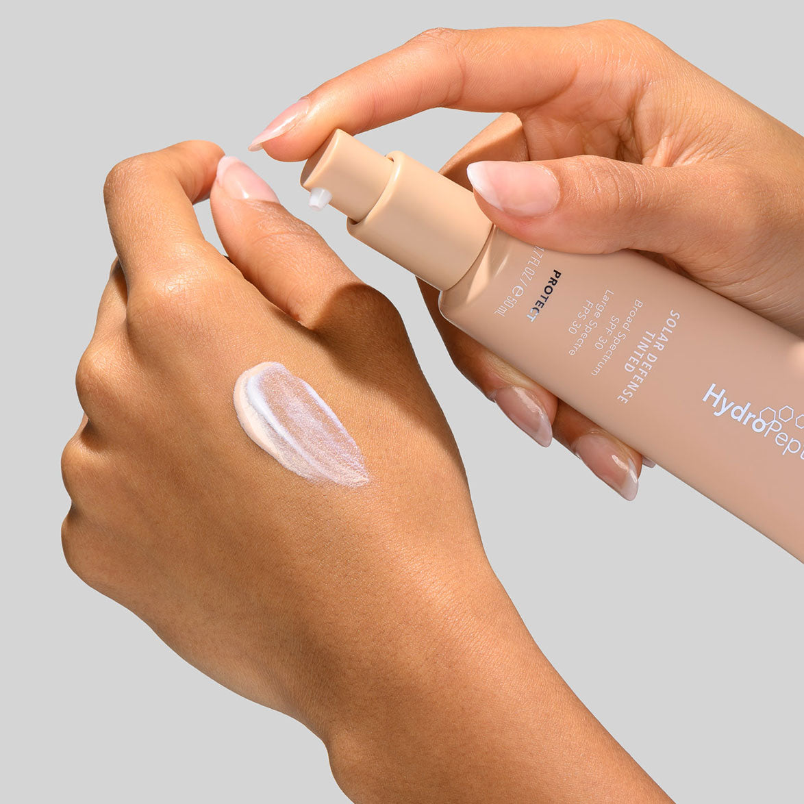 SOLAR DEFENSE TINTED SPF30 | Mineral sun protection tinted | LOSHEN & CREM