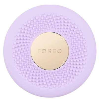 Purple silicone device with gold 'FOREO' logo on a white background