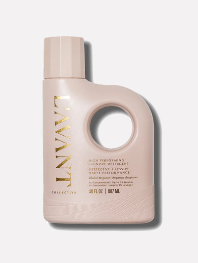 Beige bottle with gold text on a white background