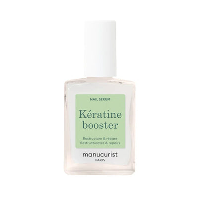 Kératin booster nail serum bottle on a white background