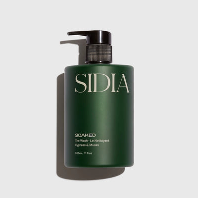 Green bottle with pump labeled 'SIDIA' on a light gray background