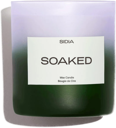 Candle labeled 'Soaked' by Sidia with a gradient design.