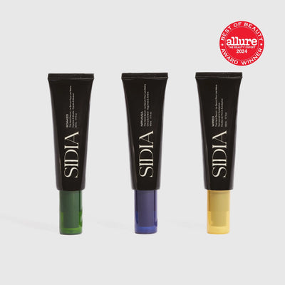 Three Sidia cosmetic tubes with colored caps on a light gray background, featuring the Allure Best of Beauty 2024 award.