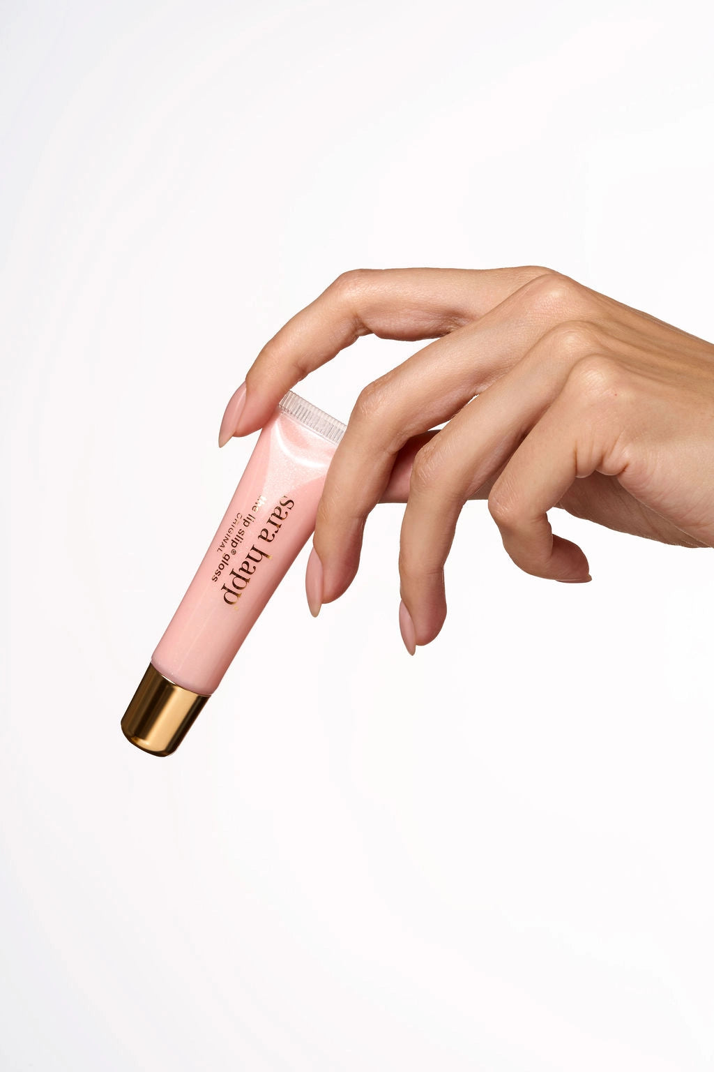 Sara Happ Lip Slip Gloss worn over lipstick for added shine