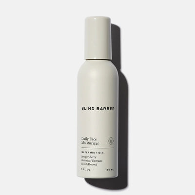 White bottle of Blind Barber Daily Face Moisturizer on a light gray background