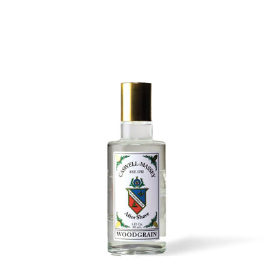 Après-rasage Woodgrain Sandalwood Caswell-Massey, flacon de 88 ml en verre transparent avec étiquette à l'emblème et bouchon doré