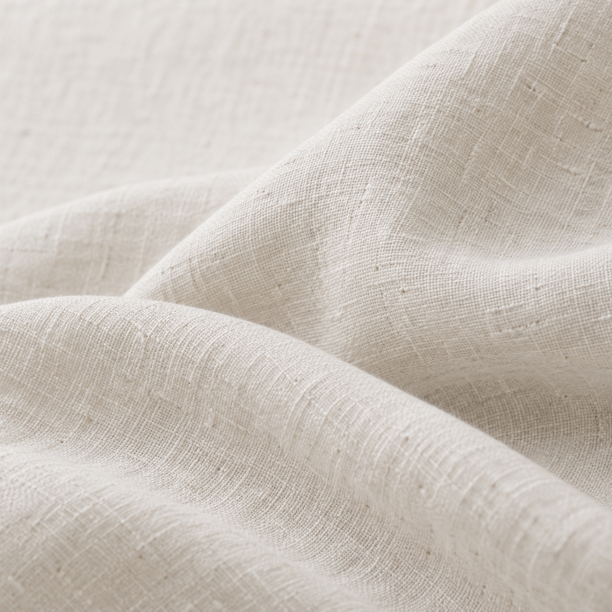 Illustrative ivory linen texture in soft folds; AI-generated editorial image.
