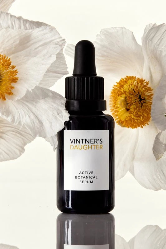 Vintner’s Daughter skincare with white flowers