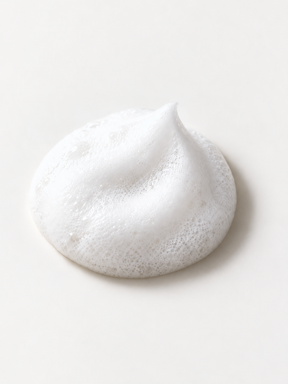 Step 1: cleansers skincare texture on a pale ivory background.